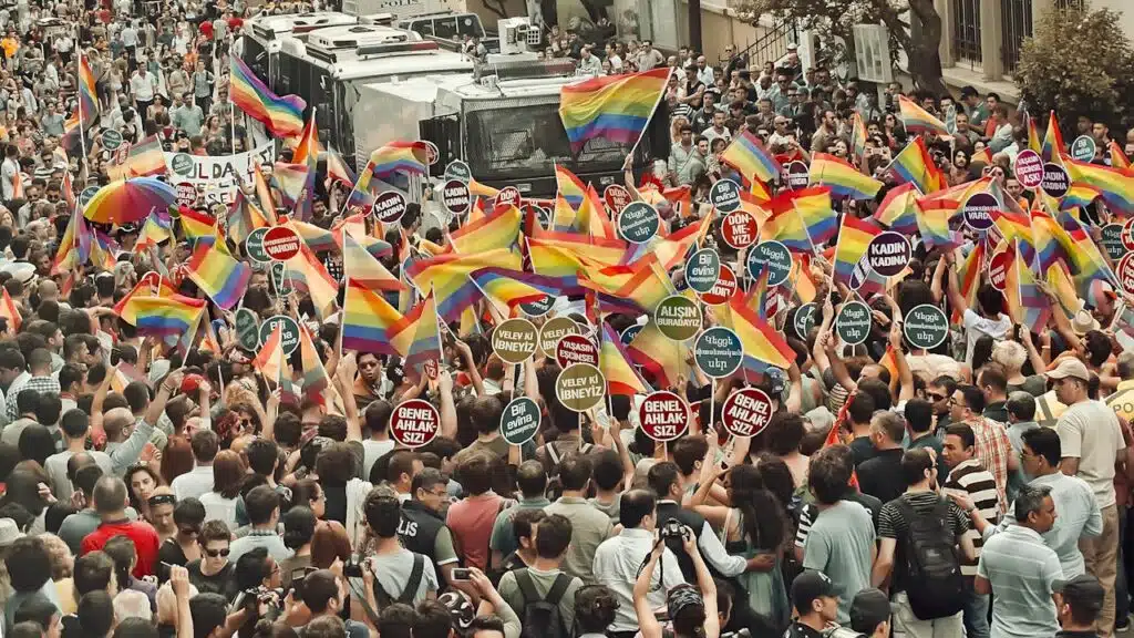 Taksim Square Istanbul 2025 FAQs People with rainbow flags during gay pride