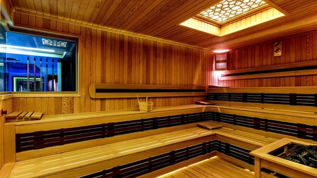 Private Turkish Bath & Hammam - Massage, & Spa in Istanbul Luxurious private Turkish bath interior in Istanbul with heated marble stone, ambient lighting, and traditional Hamam design, offering a relaxing and authentic Ottoman spa experience for tourists and couples.