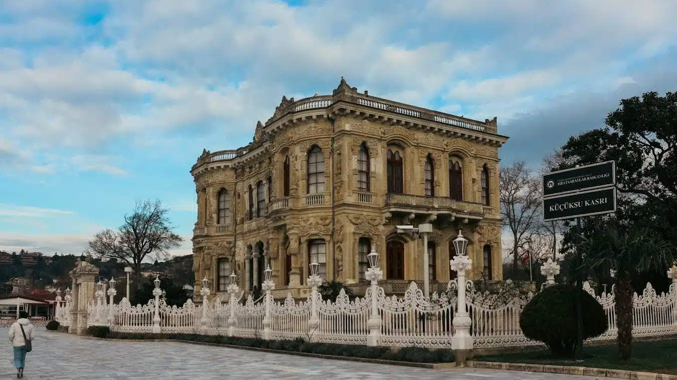 Küçüksu Pavilion: Your Complete Guide to Istanbul's Hidden Gem Elegant facade of Küçüksu Pavilion in Istanbul under a partly cloudy sky.