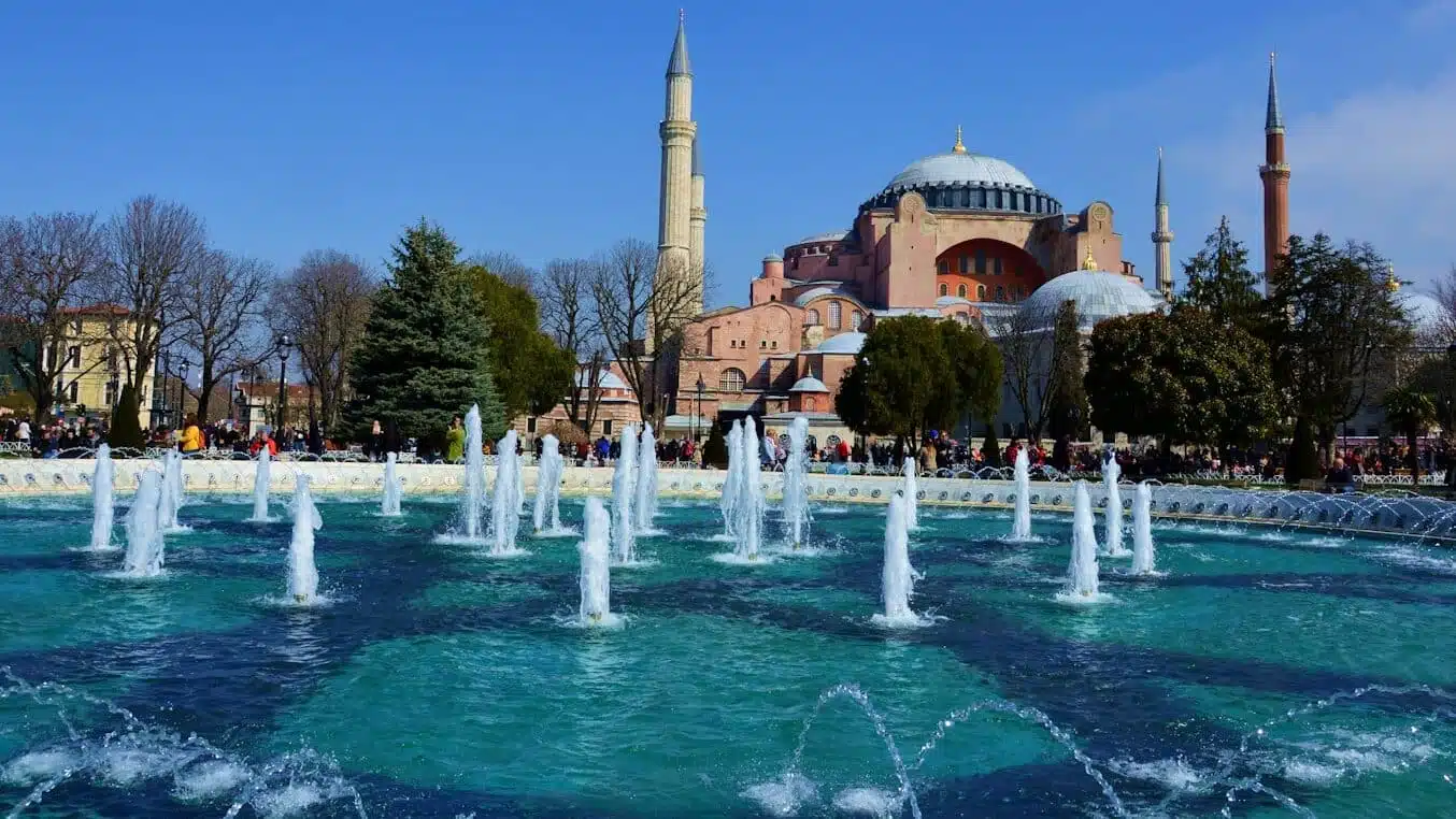 15 Things You Didn't Know About Hagia Sophia a large building with a fountain in front of it