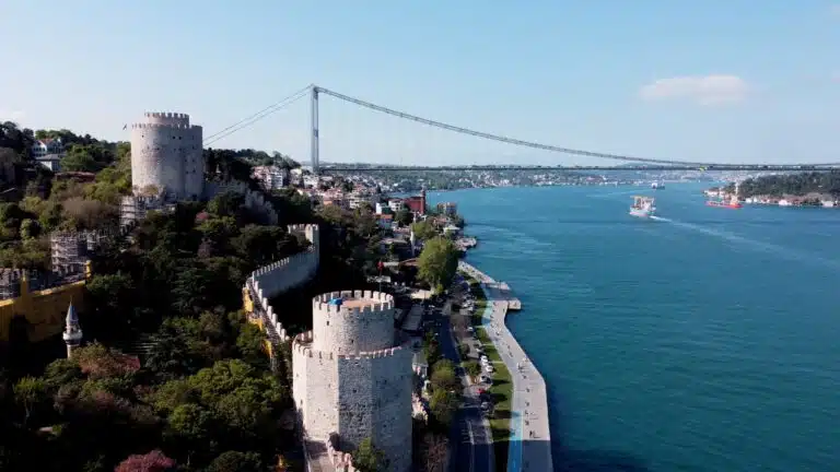 An aerial view of a river and a bridge