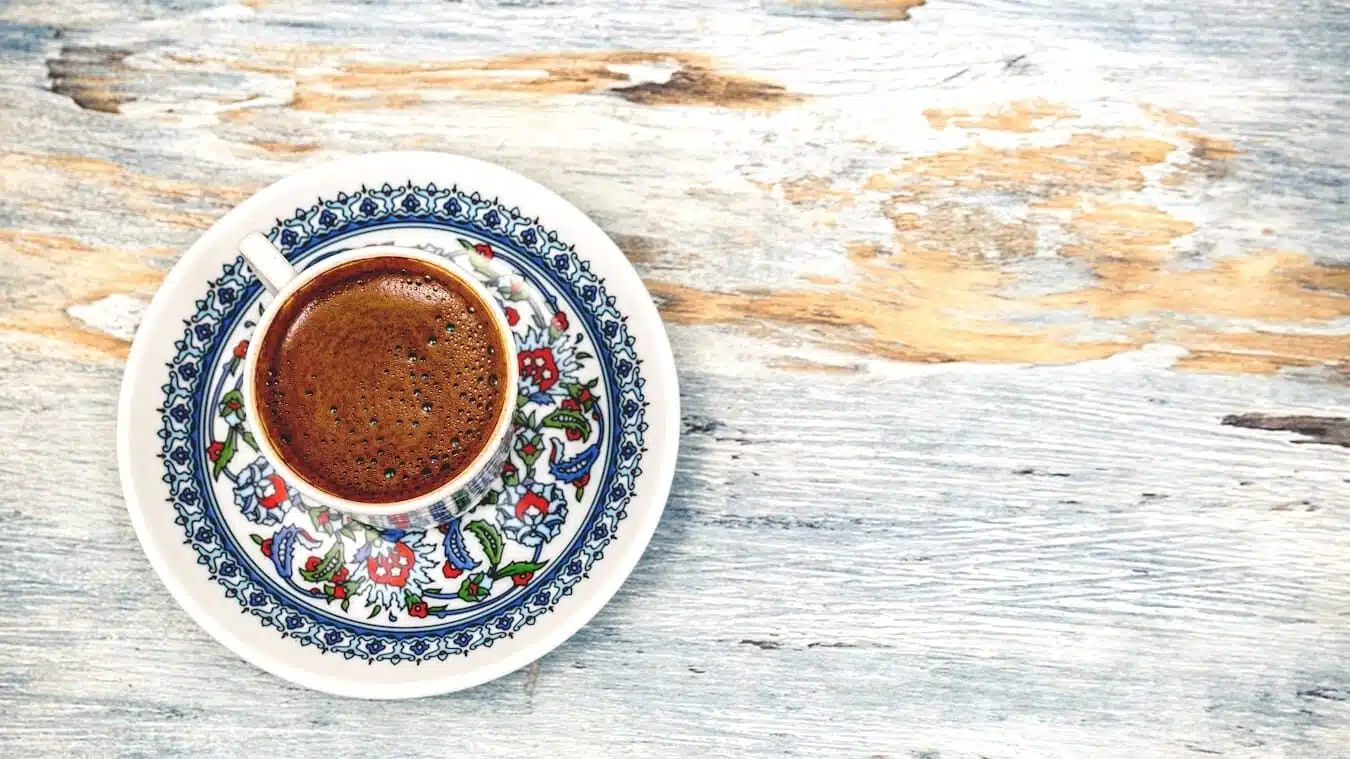 flat lay photography of cup filled with Turkish Coffee