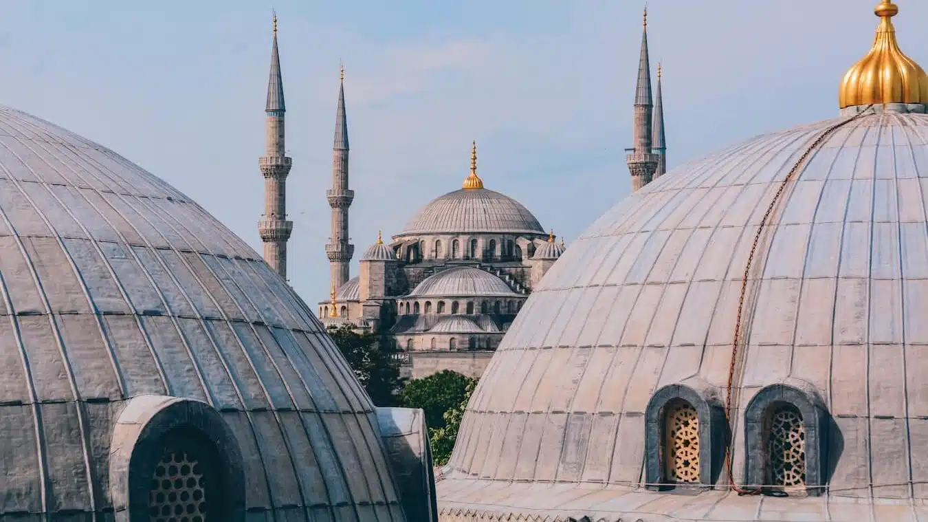 a group of domes with a sky background