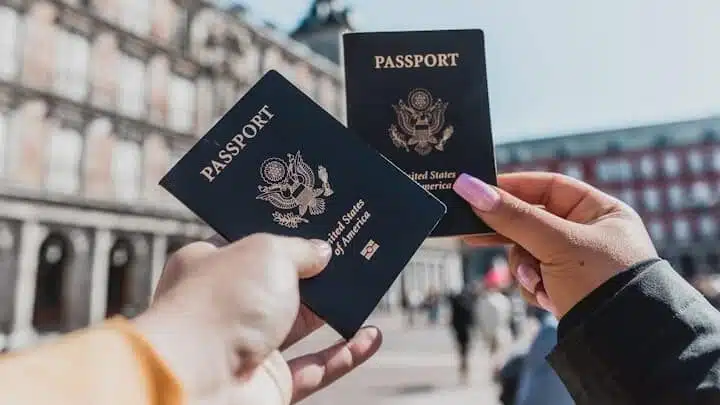 person holding passports