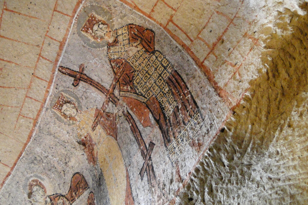Cappadocia: Fairy Chimneys, Underground Cities and Hot Air Balloons Byzantine frescoes in a rock-cut church, Cappadocia