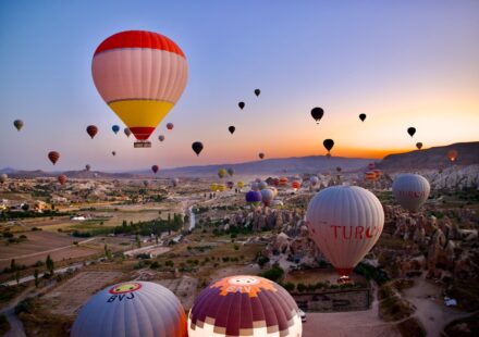 a group of hot air balloons in the sky