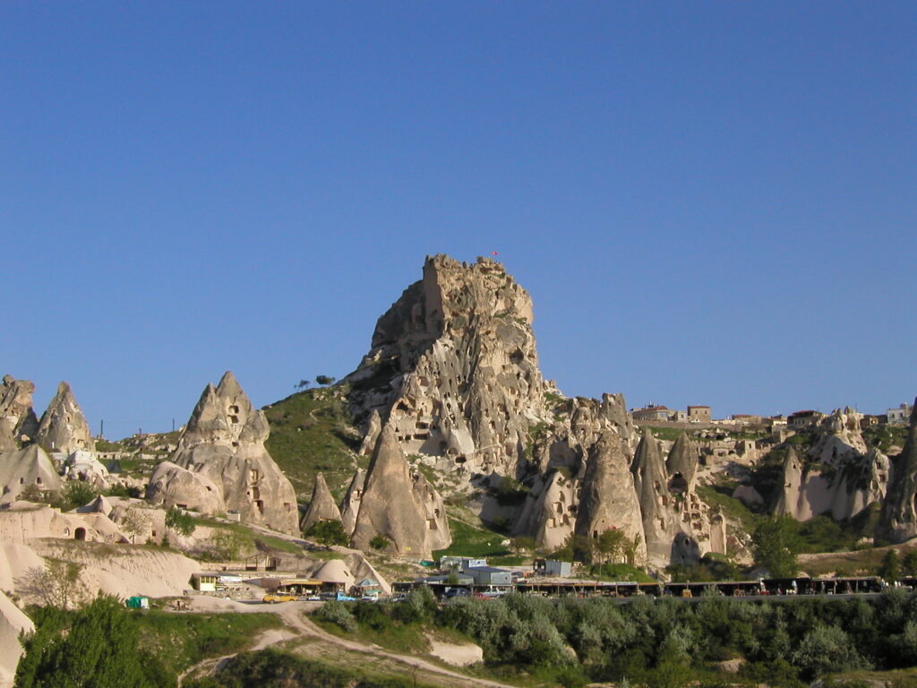 Cappadocia: Fairy Chimneys, Underground Cities and Hot Air Balloons Fairy chimneys and rock-cut dwellings in Göreme, Cappadocia
