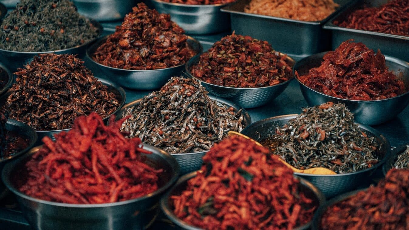 red chili peppers on stainless steel bowl