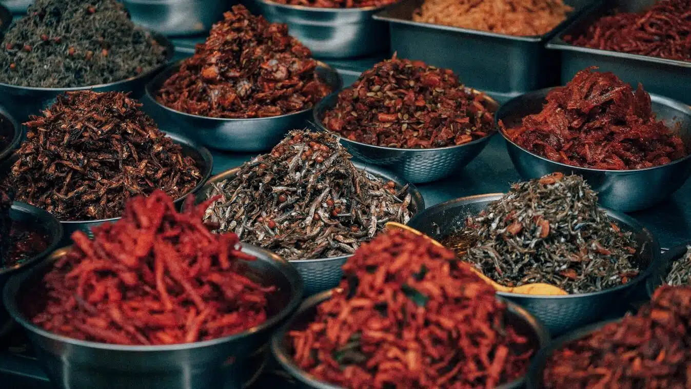 red chili peppers on stainless steel bowl