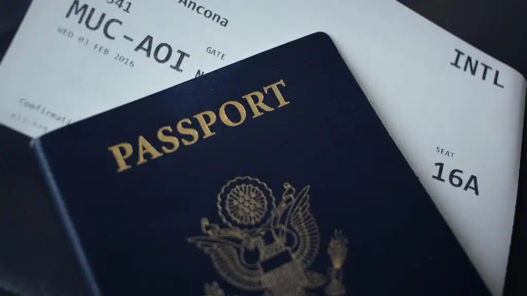 passport booklet on top of white paper