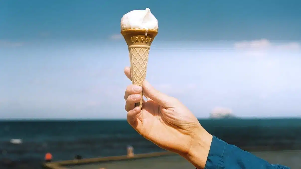 person holding ice cream cone