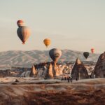 Hot air balloons over fairy chimneys in Cappadocia