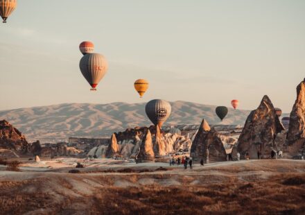Hot air balloons over fairy chimneys in Cappadocia