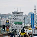 a busy city street filled with lots of traffic