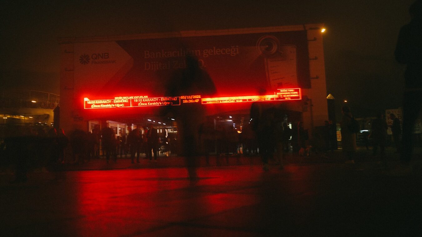Exploring Kadıköy: A Vibrant District of Istanbul a group of people standing in front of a building at night at Kadıköy