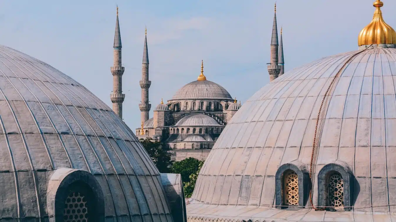 a group of domes with a sky background